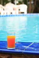 Orange Juice Near Water Pool