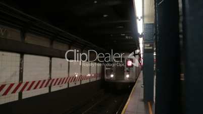 New York subway train arriving at the station Wall Street