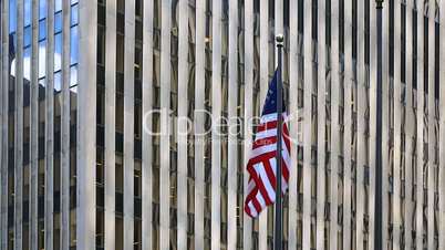 American flag on a background of a building