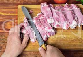 Fresh pork meat on the kitchen board