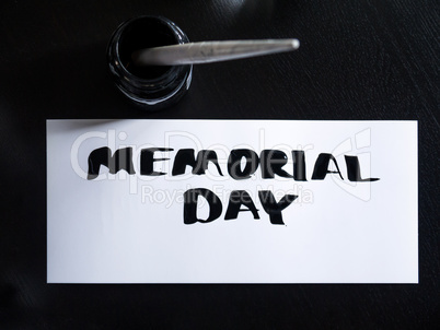 Memorial day calligraphy and lettering post card with inkstand. Top view.
