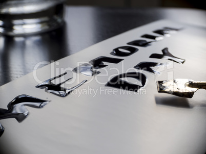 Memorial day calligraphy and lettering post card. Extremely close-up. Wide pen and glass.