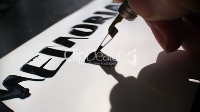 Memorial day calligraphy and lettering post card. Extremely close-up.