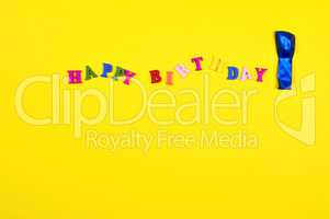 Yellow abstract background with the word  happy birthday