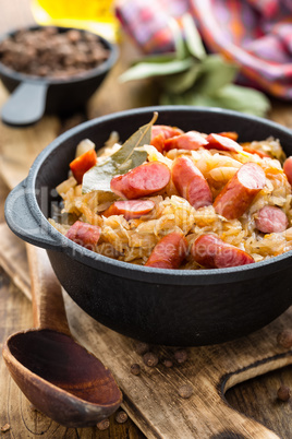 Cabbage braised with sausages, sauerkraut. German cuisine.