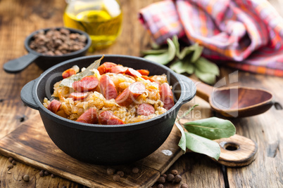 Cabbage braised with sausages, sauerkraut. German cuisine.