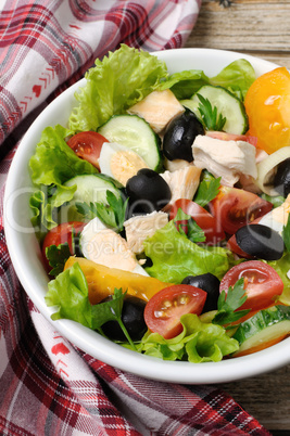 Vegetable salad with chicken and eggs