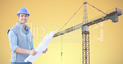 Smiling architect holding blueprint against crane