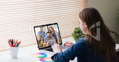 Businesswoman video conferencing in office