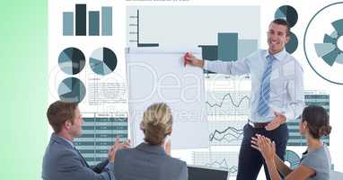 Colleagues applauding while businessman giving presentation against graphs