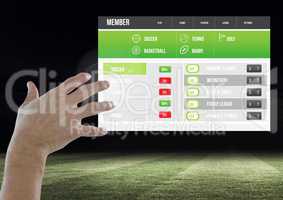 Hand touching a Betting App Interface stadium