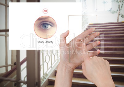 Hand Touching Glass Screen and Identity eye Verify App Interface on stairs