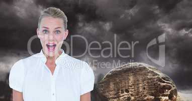 Young businesswoman screaming against cloudy sky