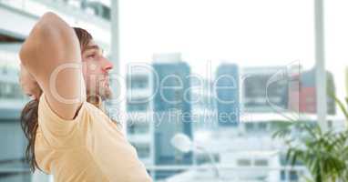 Thoughtful hipster sitting in office