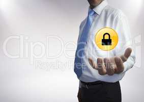 Business man mid section with yellow lock graphic and flare in hand against white background