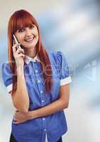 Redhead businesswoman using mobile phone