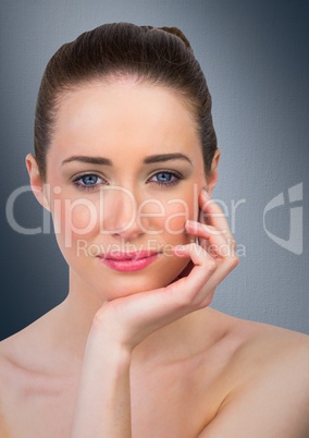 Close up of woman hand under chin against navy background