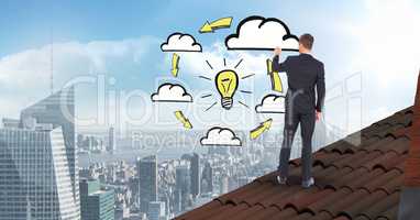 Businessman on roof  drawing graphics