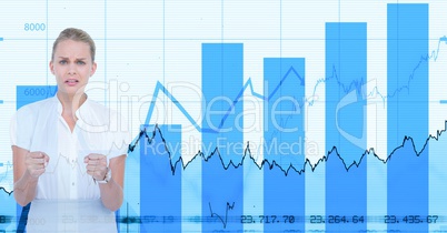 Angry businesswoman standing against graphs