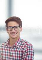 Portrait of happy male hipster over blurred background