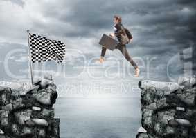 businessman with briefcase jumping on the rocks to arrive to the checker flag