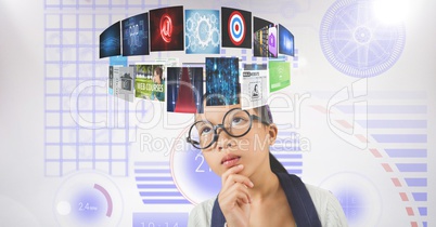 Digitally generated image of businesswoman looking at flying panels