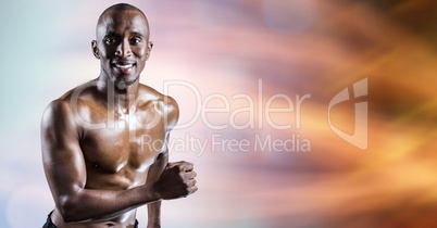 Masculine man jogging over abstract background