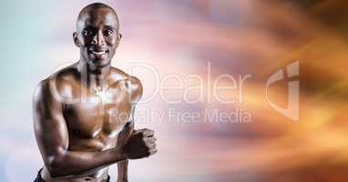 Masculine man jogging over abstract background