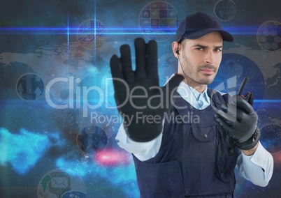 Security guard showing stop gesture while using radio