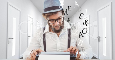 Hipster using typewriter in office