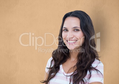 Portrait of happy female hipster against orange background