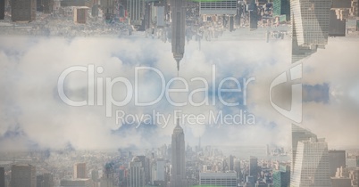 Digital composite image of upside down city against cloudy sky