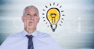 Business man thinking with lightbulb doodle against blurry blue wood panel