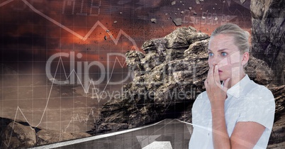 Shocked businesswoman by rocks and graphs