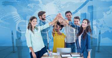 Digital composite image of business people joining hands against graphs