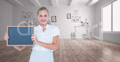 Businesswoman holding slate against graphics