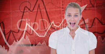 Businesswoman with mouth open against graphs