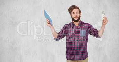 Hipster holding money and tablet PC