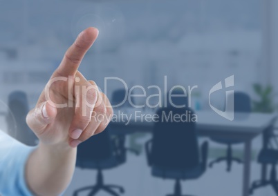 Hand pointing in  air of office meeting room