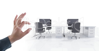 Hand touching  air of office with desks