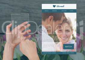 Hand holding a glass tablet with Dating App Interface