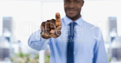 Midsection of businessman pointing at you