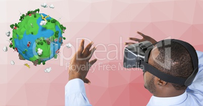 Businessman wearing VR glasses while gesturing by low poly earth