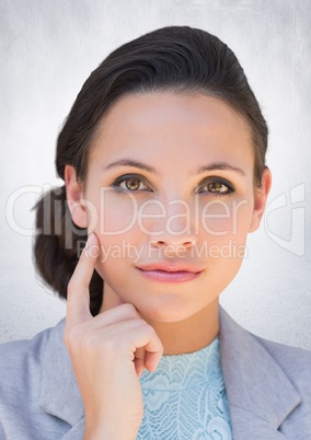 Close up of business woman thinking against white wall