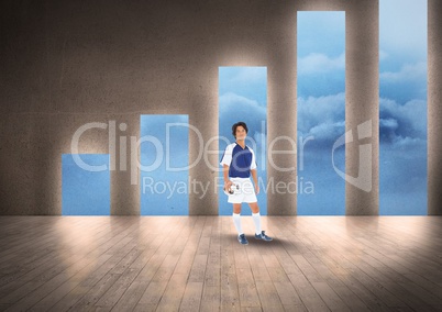 Soccer player standing against graph
