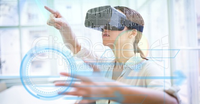 Digital composite image of businesswoman using VR glasses