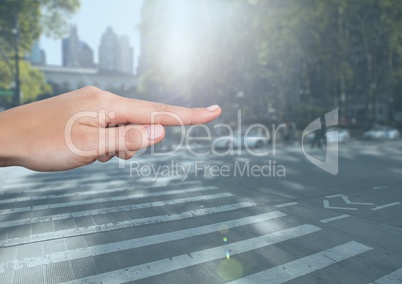Hand Touching air of city street