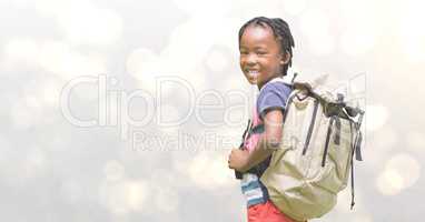 Side view of girl carrying backpack