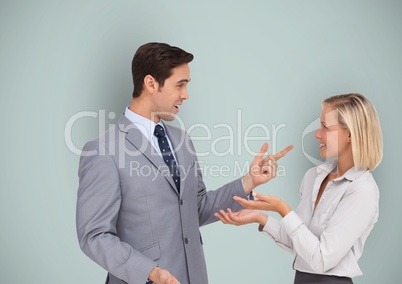 Happy business people talking against blue background