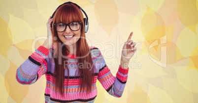 Female hipster listening to music on headphones